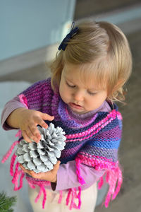 Close-up of cute girl looking away