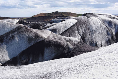 Scenic view of snow covered land