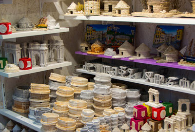 Various souvenir displayed for sale in store