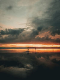 Scenic view of dramatic sky during sunset