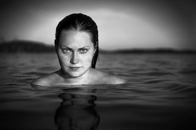 Close-up portrait of a boy swimming in pool