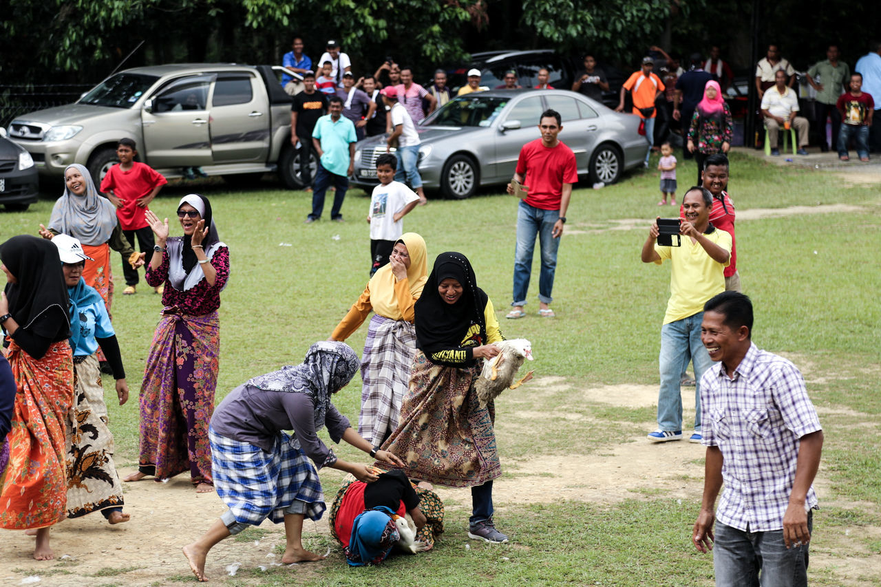 PEOPLE ENJOYING ON FIELD