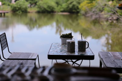 Lifeguard hut on table by lake