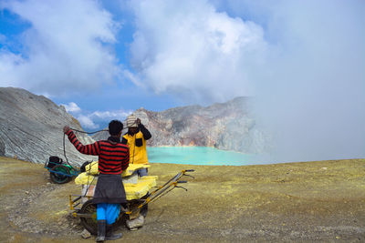 Sulfur miners on mount ijen