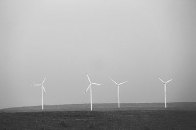 Low angle view of windmill against clear sky