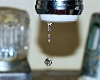 Close-up of water falling from faucet