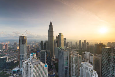 High angle view of cityscape against sky during sunset