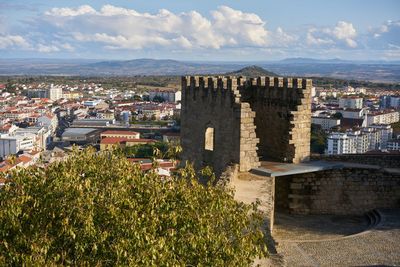 Castle tower with castelo branco city behind in portugal