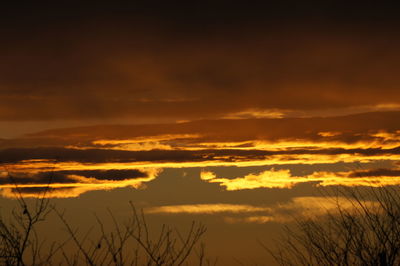 Scenic view of landscape against sky during sunset