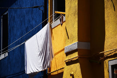 Clothes drying against building