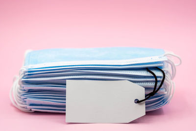 Close-up of papers over white background