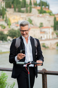 Man using mobile phone outdoors