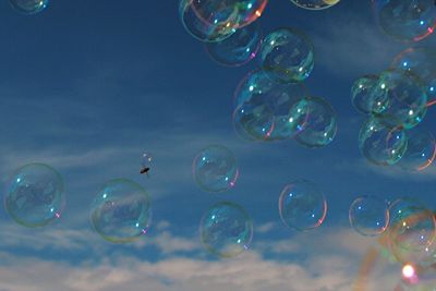 Close-up of bubbles against white background