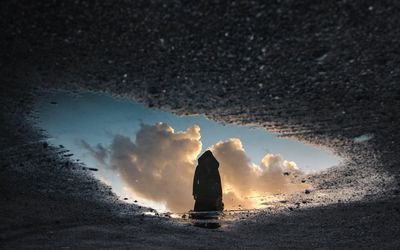 Scenic view of sea against sky at night