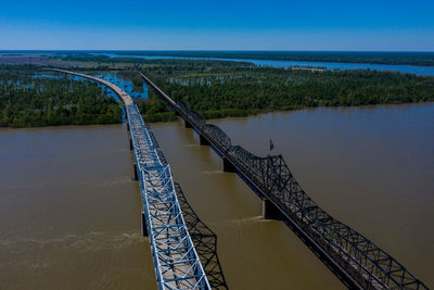 High angle view of bridges over a river against the sky