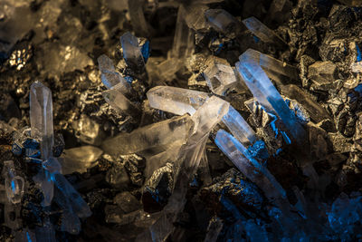 High angle view of crystals on rock