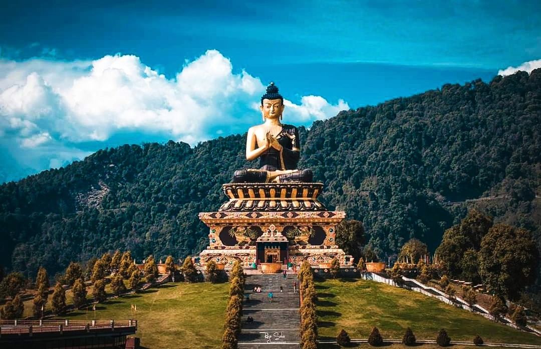 one person, cloud - sky, mountain, architecture, sky, nature, young adult, history, real people, front view, the past, day, standing, built structure, leisure activity, lifestyles, travel, tree, plant, travel destinations, outdoors