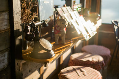 Close-up of electric lamp on table