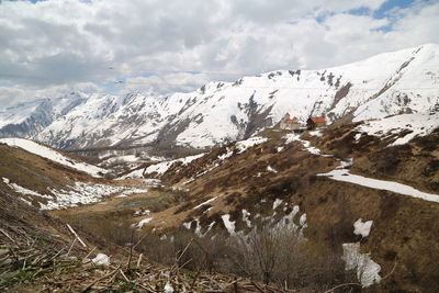 Snow covered mountain against sky