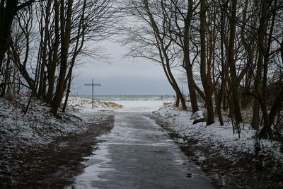 Scenic view of sea against sky during winter