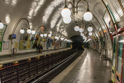 Illuminated railroad station platform