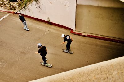 High angle view of boys playing on floor