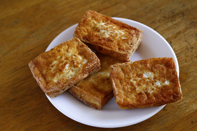 High angle view of breakfast in plate on table