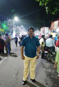 People on street at night