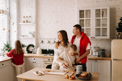 Side view of woman preparing food at home