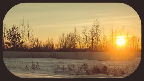 Scenic view of landscape against sky during sunset