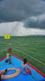 Scenic view of sea against cloudy sky