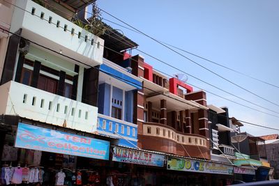 Low angle view of buildings against clear sky