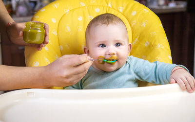 Close-up of boy eating food