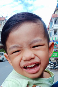 Portrait of cute boy smiling