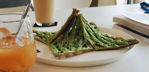 Close-up of salad in plate on table