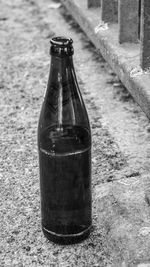 Close-up of empty glass bottle