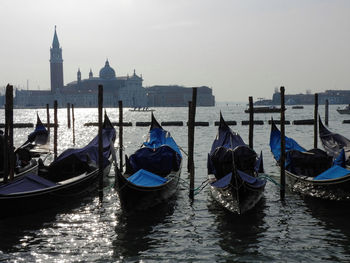 Gondolas on grand canal in city