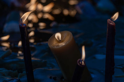 Close-up of illuminated candle