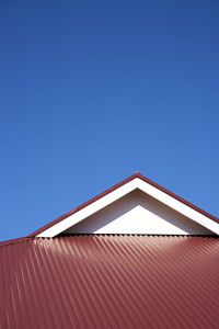 Low angle view of building against blue sky