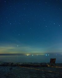 Scenic view of sea against sky at night