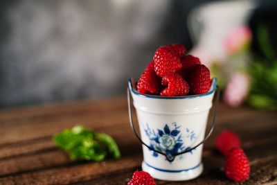 Close-up of strawberries in bowl on table