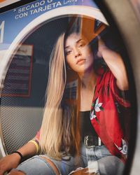 Portrait of a woman sitting in car