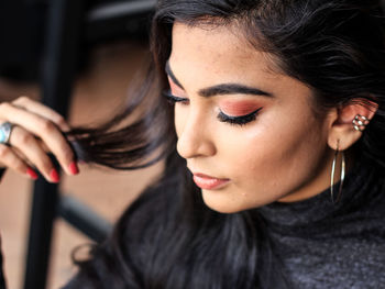 High angle close-up of young woman with make-up