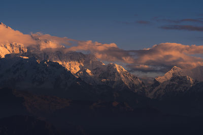 First ray of morning sun on the majestic kangchenjunga range, viewed from sandakphu.