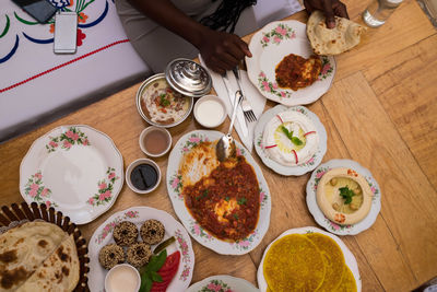 Black woman eating arabic food