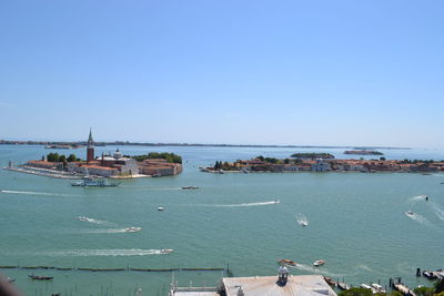 Scenic view of sea against clear blue sky