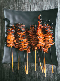 High angle view of isaw, a very popular filipino streetfood, on table
