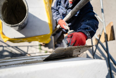 Low section of man working