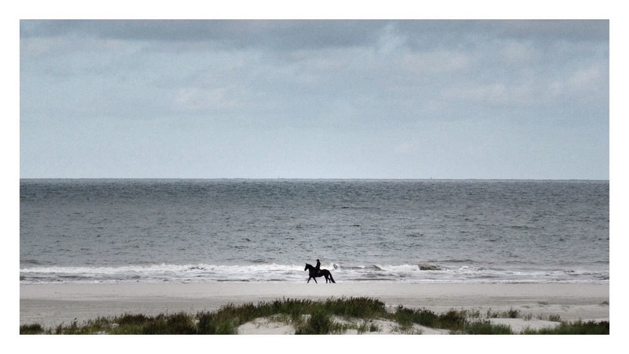 sea, water, transfer print, beach, leisure activity, lifestyles, auto post production filter, men, horizon over water, shore, wave, sky, vacations, tourist, sand, nature, scenics, beauty in nature