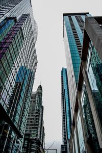 Low angle view of modern buildings against clear sky